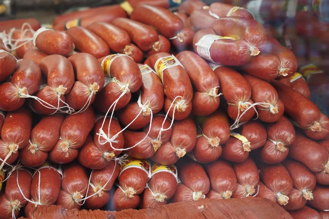 Stock photo of sausages arranged in a market display
